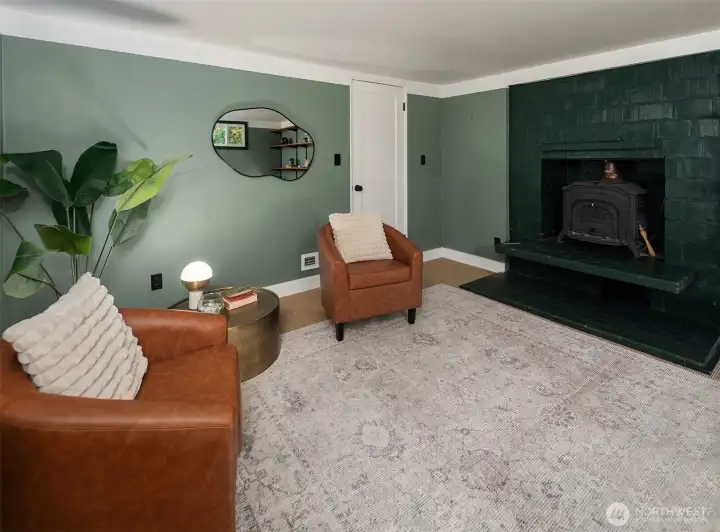 Another angle of the lower level family room which has excellent potential for a multi-use space ... bedroom, office, work-out room, media room.