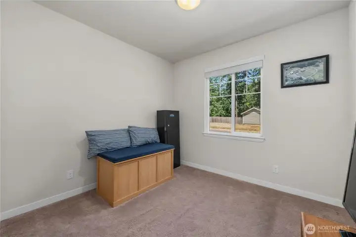 Additional bedroom or flex space with natural light, neutral walls, and room for a bedroom, office, hobby area, or playroom. Additional bedroom or flex space with natural light, neutral walls, and room for a bedroom, office, hobby area, or playroom.