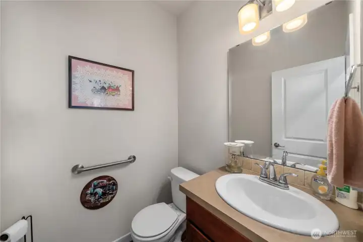 Secondary bathroom with vanity storage, neutral finishes, and convenient access for guests or additional bedrooms. Secondary bathroom with vanity storage, neutral finishes, and convenient access for guests or additional bedrooms.