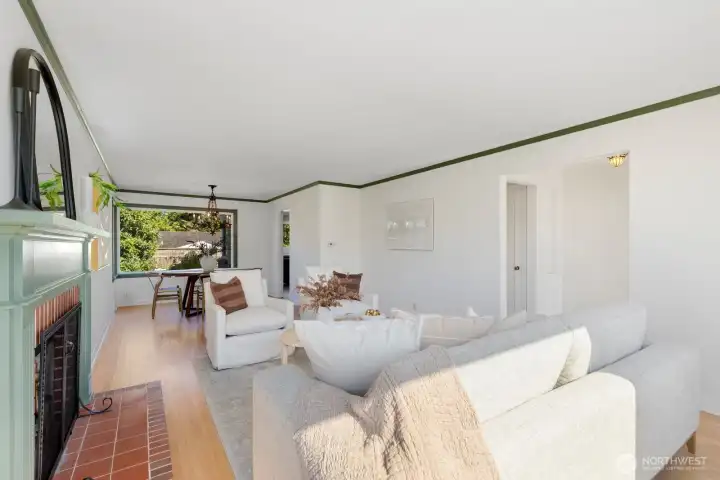 From this angle, you can see the entryway pictured to the right. From the entry, there is a hallway that leads to the two main floor bedrooms and full bath. From this angle, you can see the entryway pictured to the right. From the entry, there is a hallway that leads to the two main floor bedrooms and full bath.