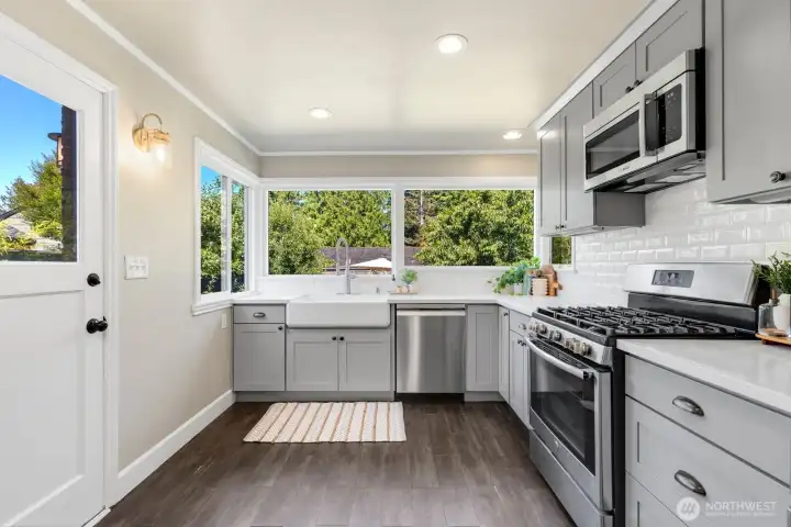 Why have just one window at the kitchen sink when you can have a wall of them? Why have just one window at the kitchen sink when you can have a wall of them?