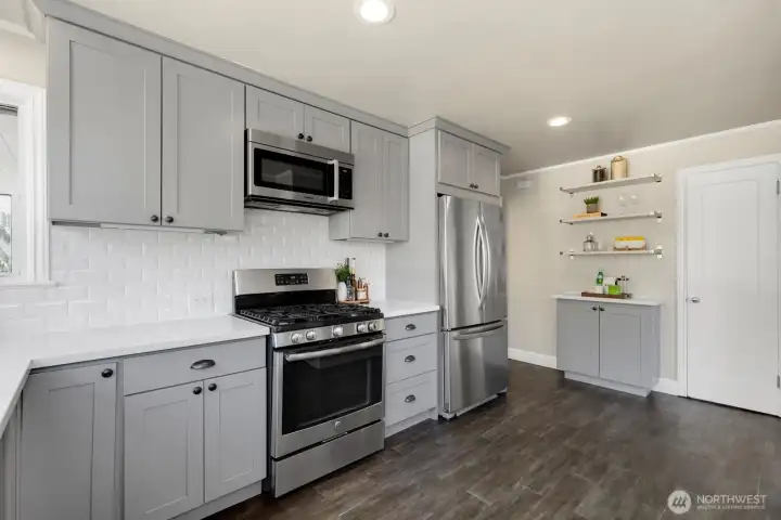 More storage on this little bar area - and the pantry is the door to the right in this photo. Plenty of storage! More storage on this little bar area - and the pantry is the door to the right in this photo. Plenty of storage!