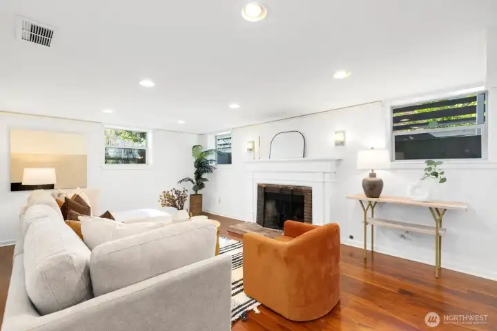 Upon entry to the lower level, you'll find this oversized rec room with gas fireplace. Upon entry to the lower level, you'll find this oversized rec room with gas fireplace.