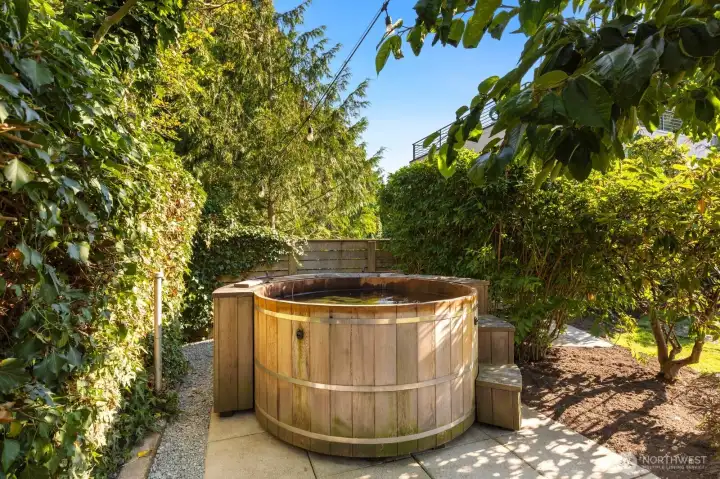 The electric cedar hot tub is a private oasis - hidden from view and the ideal spot to relax. The electric cedar hot tub is a private oasis - hidden from view and the ideal spot to relax.