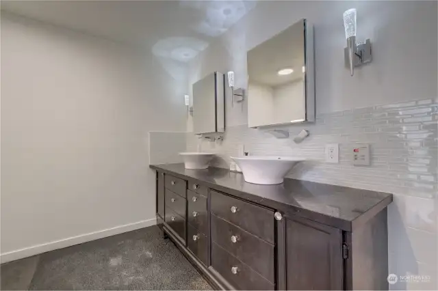 Bathroom with 2 Lotus sinks, new lighting, mirrors and heated floor!