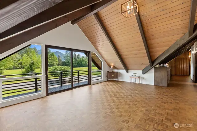 Second level living space. Beautiful parquet floors and balcony. More incredible views!