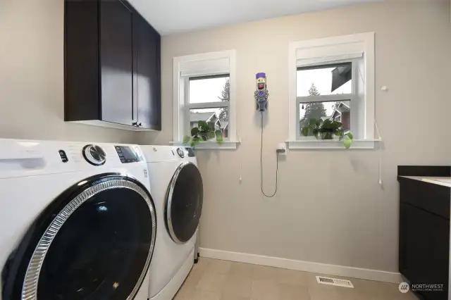 Laundry room located upstairs comes with the washer and dryer!