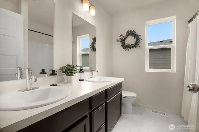 Photographs are for illustrative purposes only. Features, finishes, interior/exterior colors, landscaping and floorplan shown may vary from actual homes built.