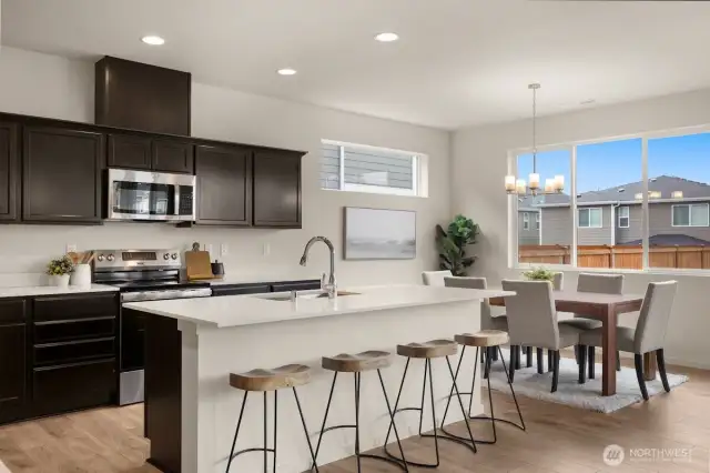 Photographs are for illustrative purposes only. Features, finishes, interior/exterior colors, landscaping and floorplan shown may vary from actual homes built.