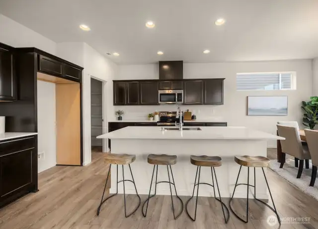 Photographs are for illustrative purposes only. Features, finishes, interior/exterior colors, landscaping and floorplan shown may vary from actual homes built.