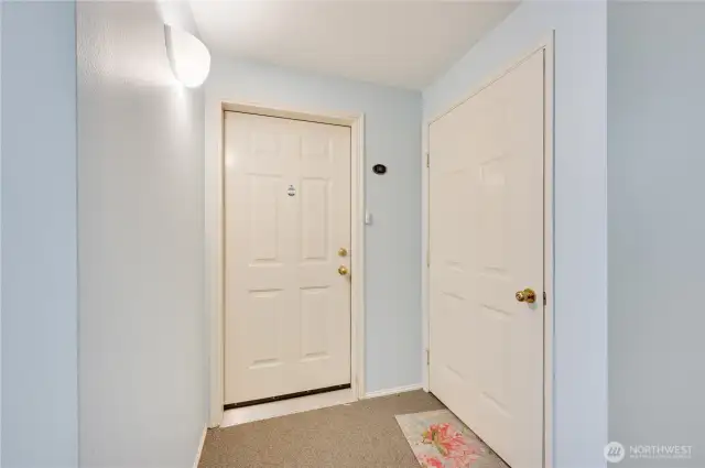 Entry door & Private storage unit on the left