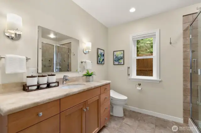 Spa-like bath and convenient in-suite laundry.