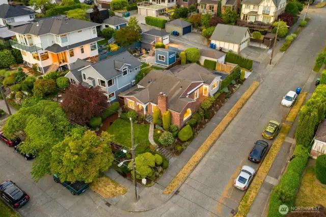 Detached garage off alley completes the package.