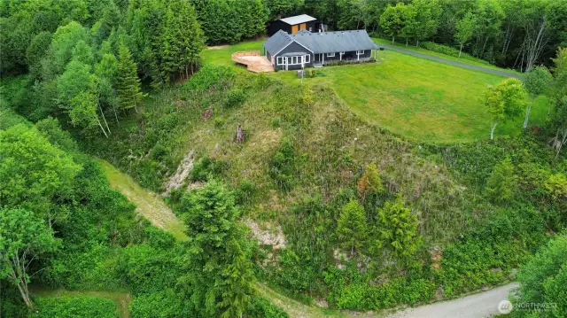 Beautiful home & shop perched on over 12 private acres overlooking the Julia Butler Hansen Refuge & Columbia River in West Cathlamet....