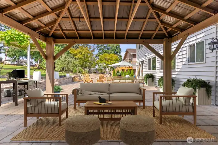 Backyard patio space with covered Mezzanine off of the 14th Hole on the Twin Lakes Golf Course!