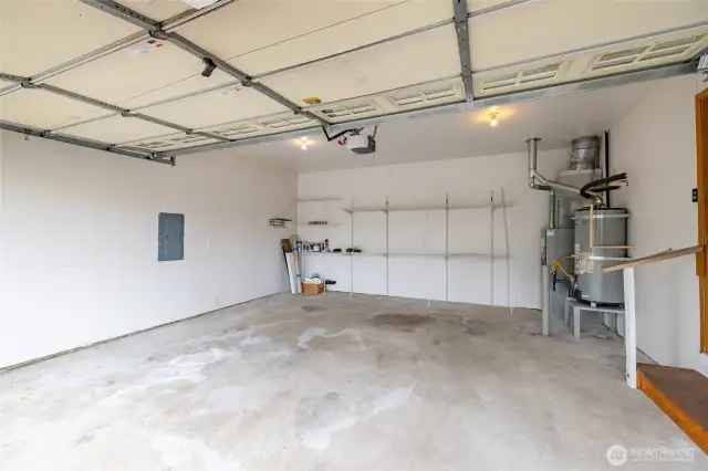 2 car garage with shelving.