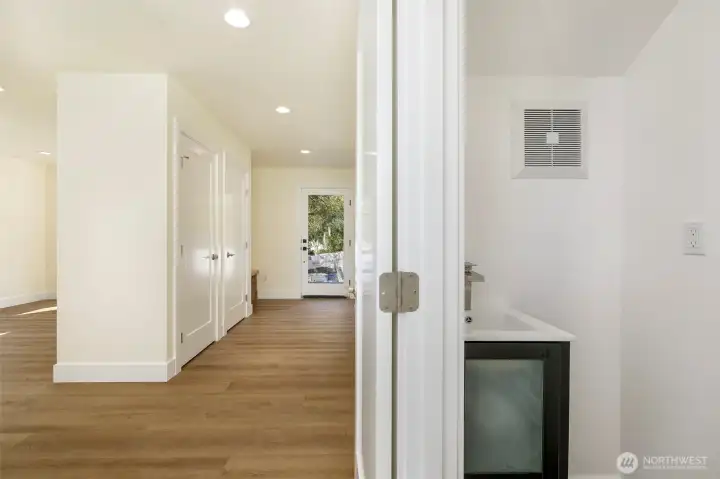 View of hallway to upstairs from entry way