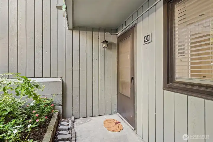 Front door area. Plant your favorite plants year round!