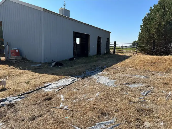 Back side of corral.  Note frost free faucets and automatic waterer. Extra panels are included.