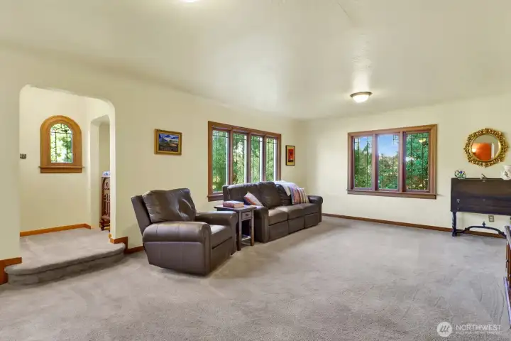 The great room opens to a nook, currently being used as an office