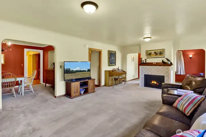 A large great room with a cozy gas fireplace