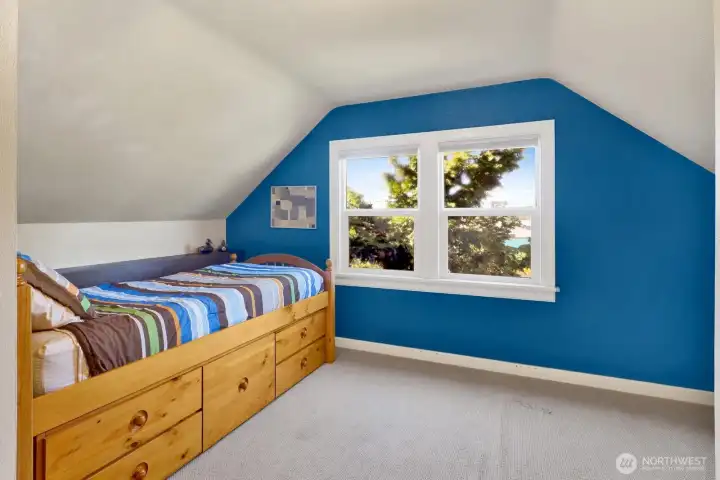 Upstairs bedroom #2 is also airy and bright