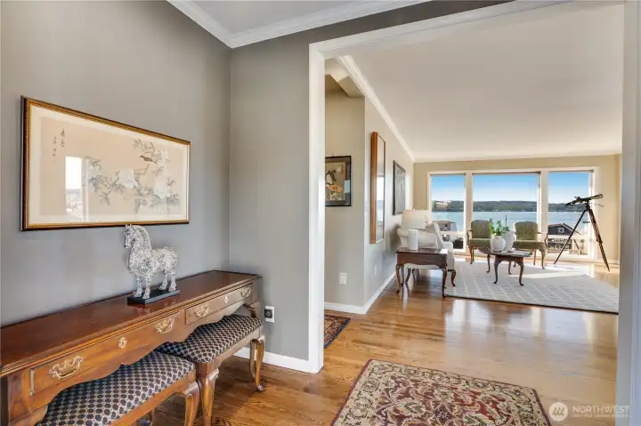 Enter this showplace with beautiful hardwood floors and walls of windows to take in the views!