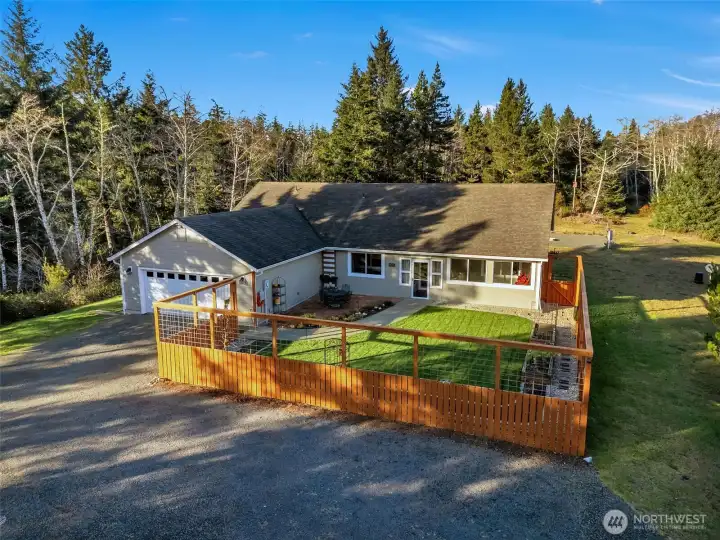 Located in a quiet, sunny setting, this 10-acre property offers space to expand and a true connection to nature.