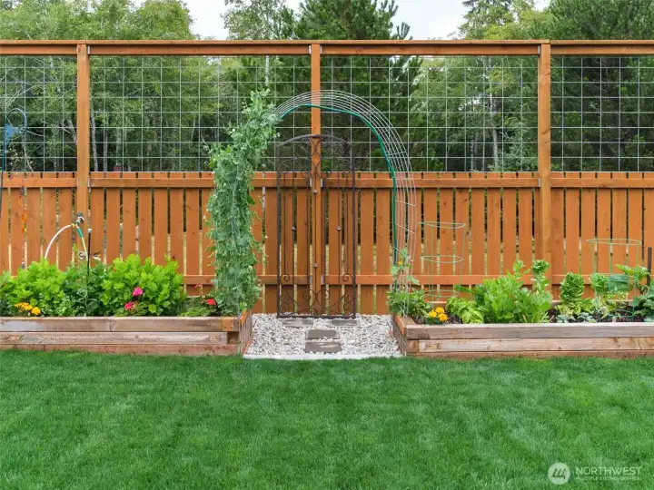 Beautiful archway in the spring. (this photo was supplied by the owner from an earlier date.)