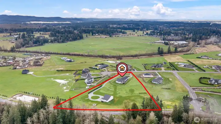 With 4.98 acres, the possibilities are endless!