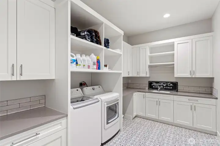 Large Laundry Room with Generous Counter Space.