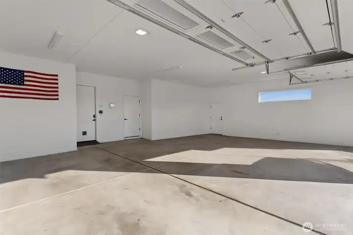 Oversized Finished Three Car Garage.