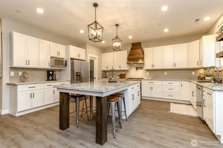 Granite/ courts counters, tile backsplash.