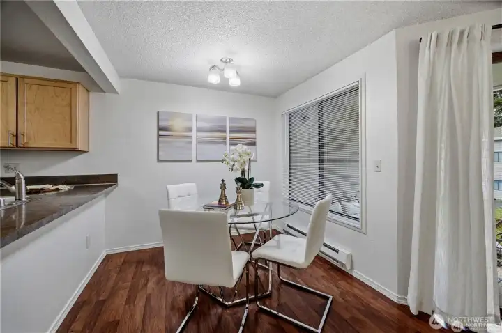 dining room window faces north. Sliding door to patio behind drape