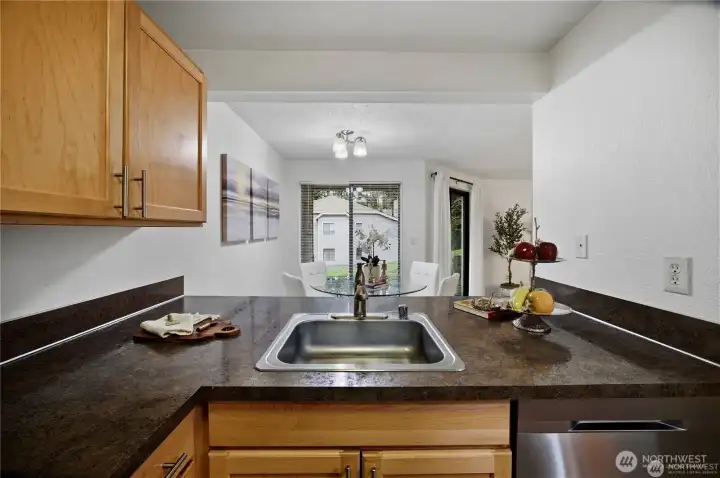 Kitchen looking north to dining room and patio
