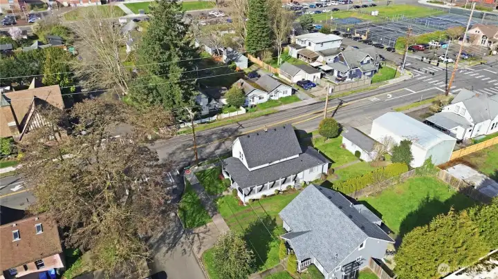 Aerial view of home, surrounding homes, and Puyallup High School.