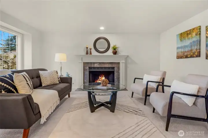 Formal living room with wood-burning fireplace