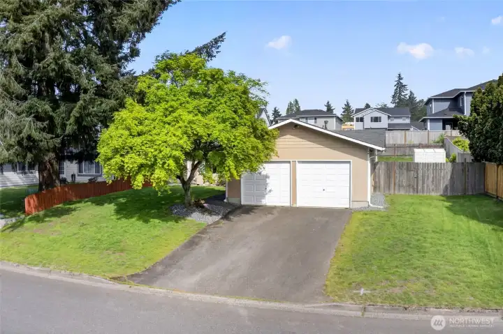 Fence on right side of home is removable, RV parking with 220 hook-up.