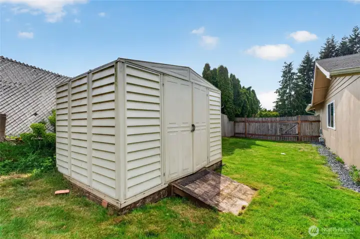 Large outbuilding perfect for your yard tools.
