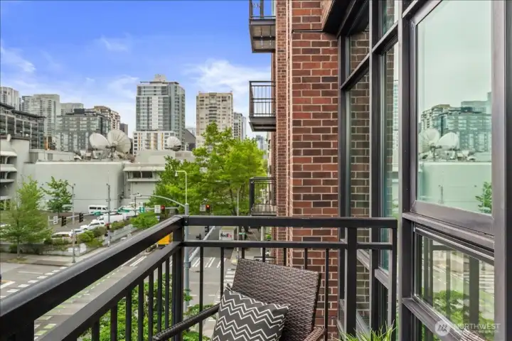 Your very own spacious balcony with city and Space Needle Views.