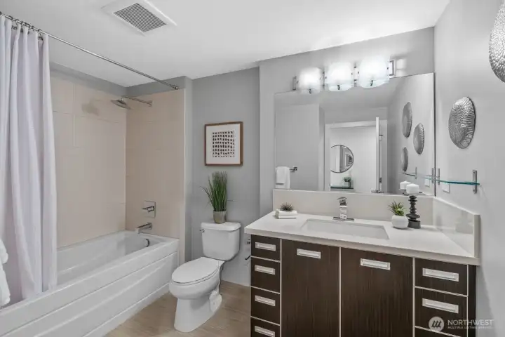 Second bathroom, beautiful tile, great lighting and more.