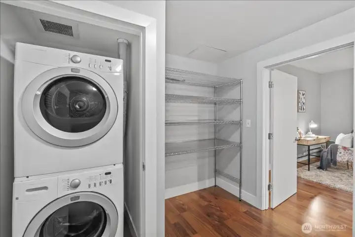 You don't want to miss this extra room, shelving stays, washer and dryer are enclosed and the rest of the space can accommodate many options, yoga room, your pelo, maybe add some custom shelving!!