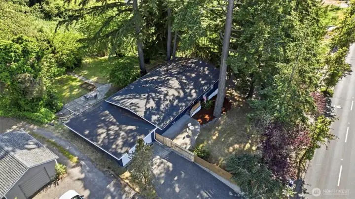 A view from above shows the matrure trees and landscaping. Home faces north so it stays cool on those hot days.