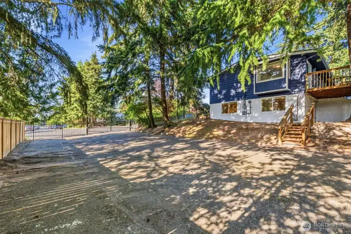 Lower parking area for guest and also serves as a sport court.