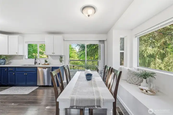 Eat in space in the kitchen which connects to the back deck. The built in nook can serve as a great place to enjoy a meal or relax.