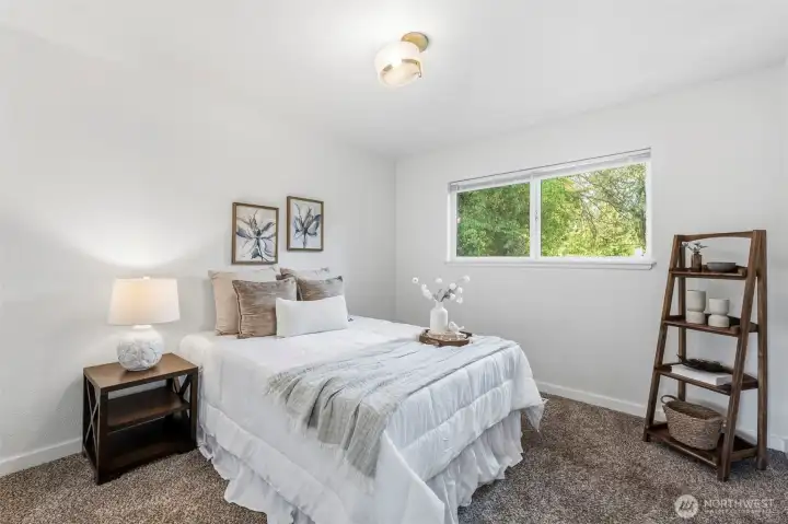 Bedroom number two is located on the main floor directly across from bedroom number one.