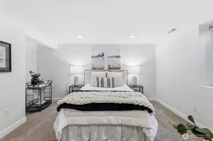 The primary en suite is located downstairs to the rear of the home away from S. 19th st.
