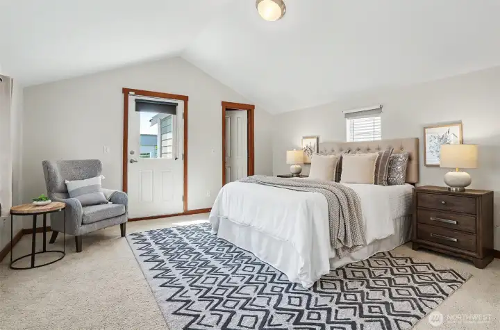 Upstairs, a serene Primary Suite. Door on the left leads to your private deck and door on the right, to your walk-in closet.