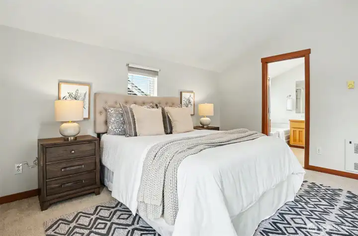 Door in view leads to 5-piece en suite bathroom.