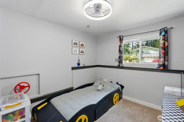 Bedroom number 5, on the lower level, faces the front yard.
